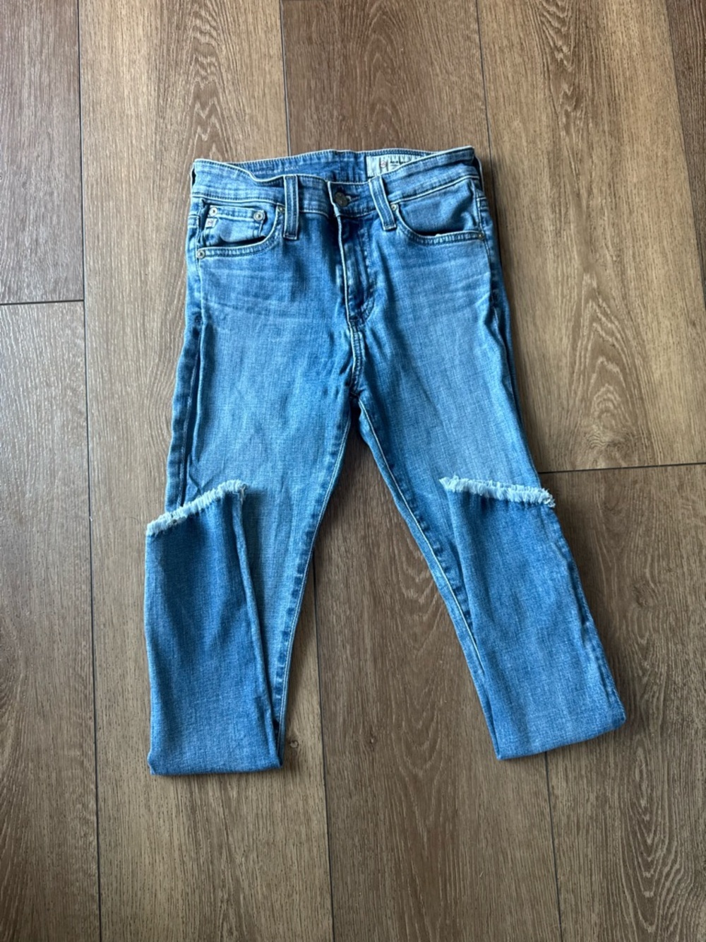 AG Adriano Goldschmeid Light Wash Raw Hem Skinny Jeans